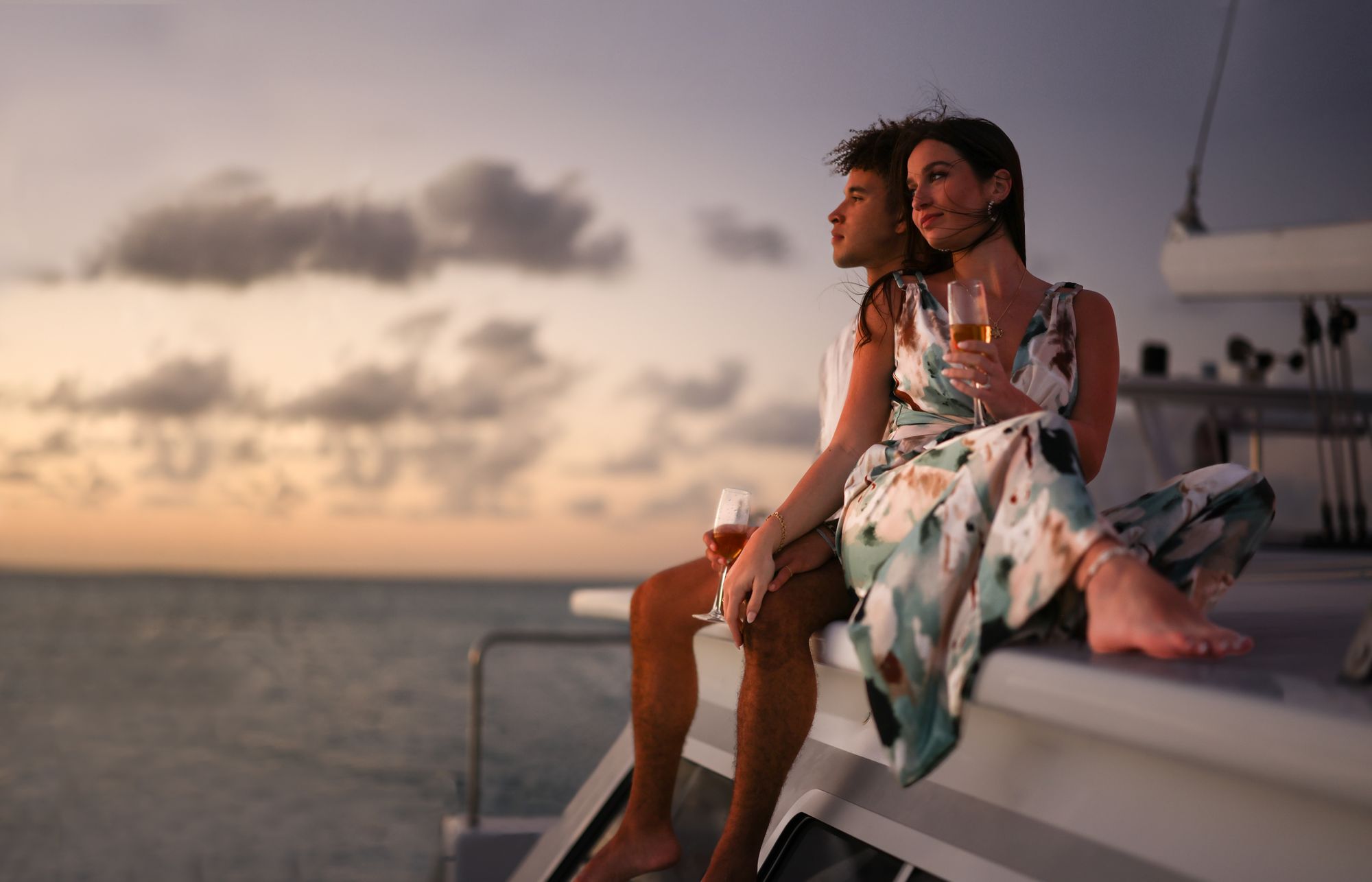 couple sunset catamaran cruise