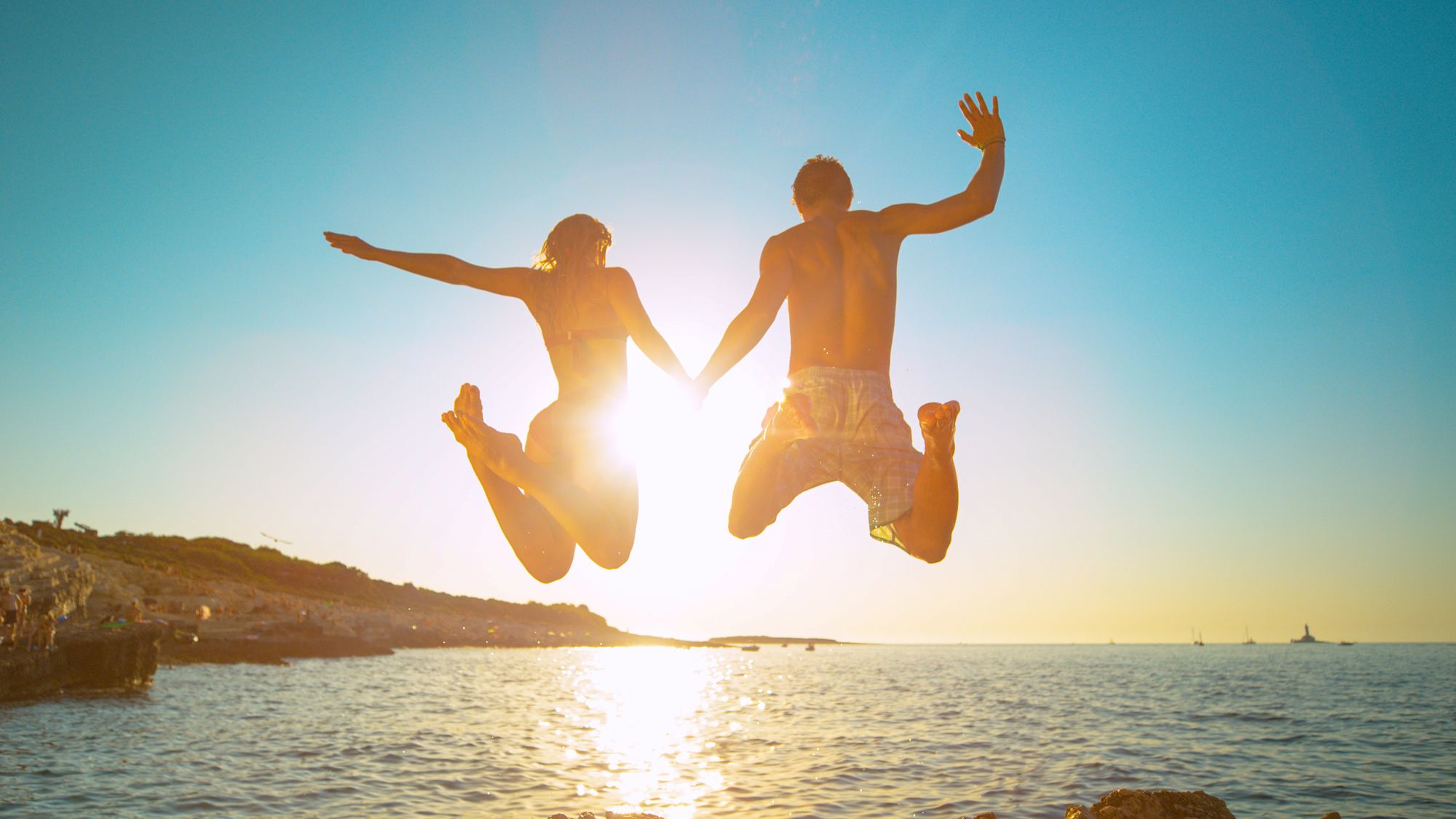 cliff jumping couple