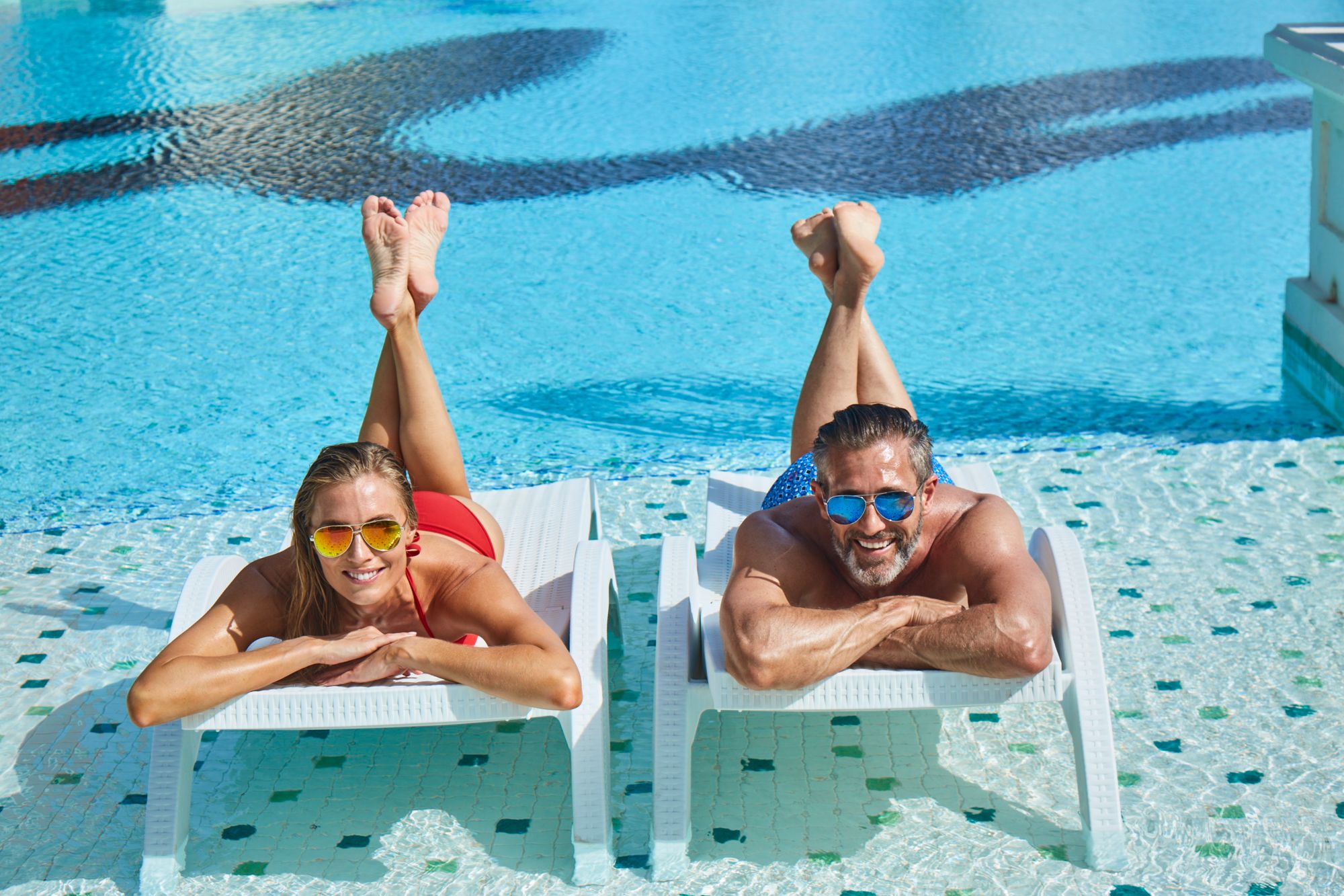 SAT-Lifestyle-Main-Pool-Couple-1