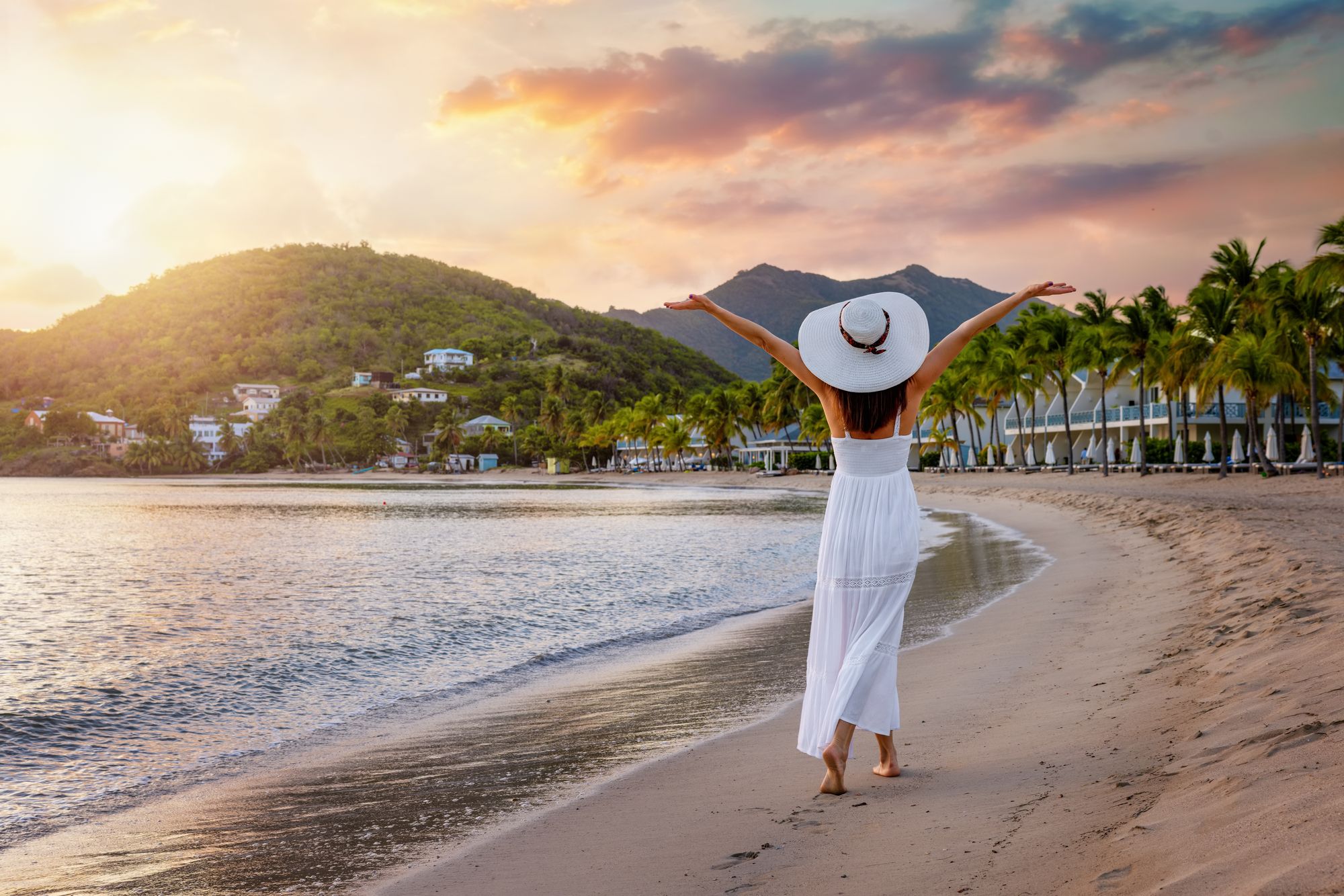 woman walking on Caribbean beach