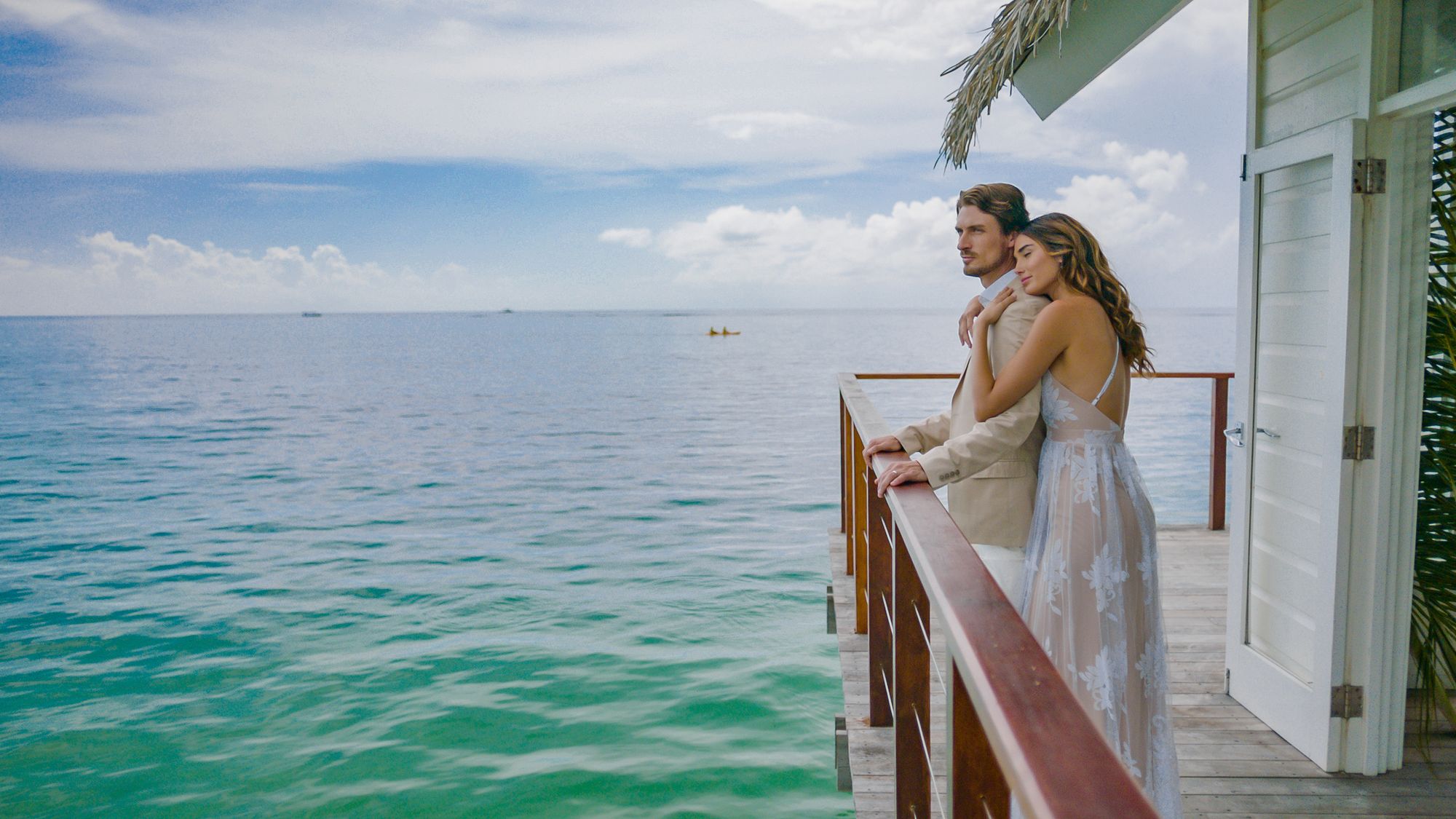 couple getting married Sandals overwater wedding chapel