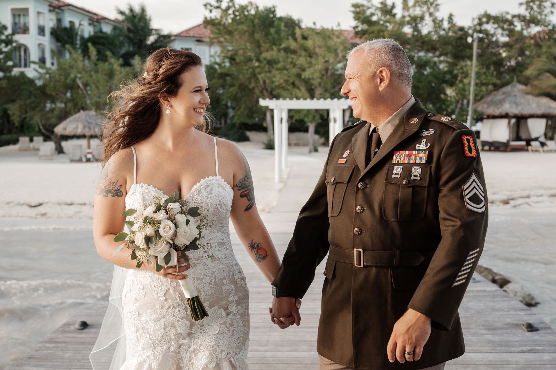 bride_groom_holding_hands_outside_olga_sam