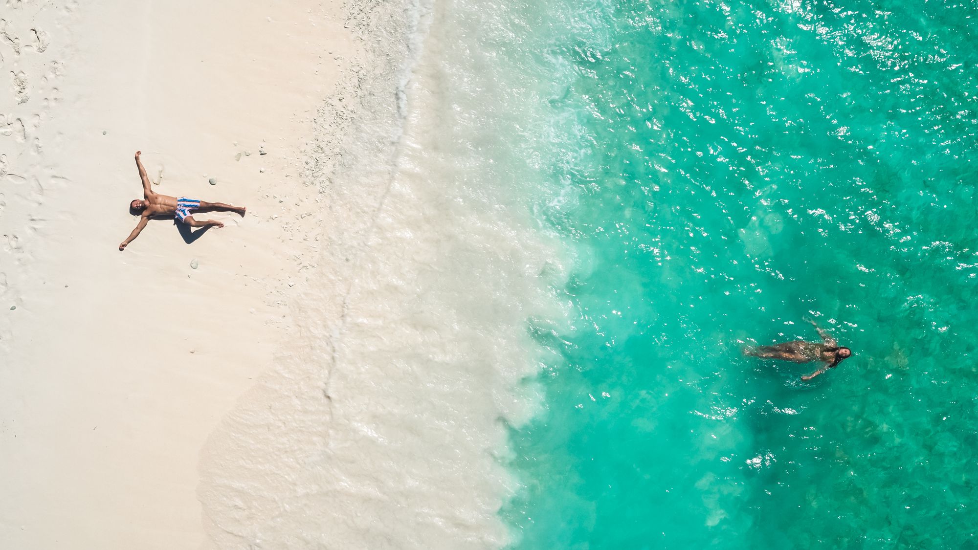 couple on beach in Caribbean