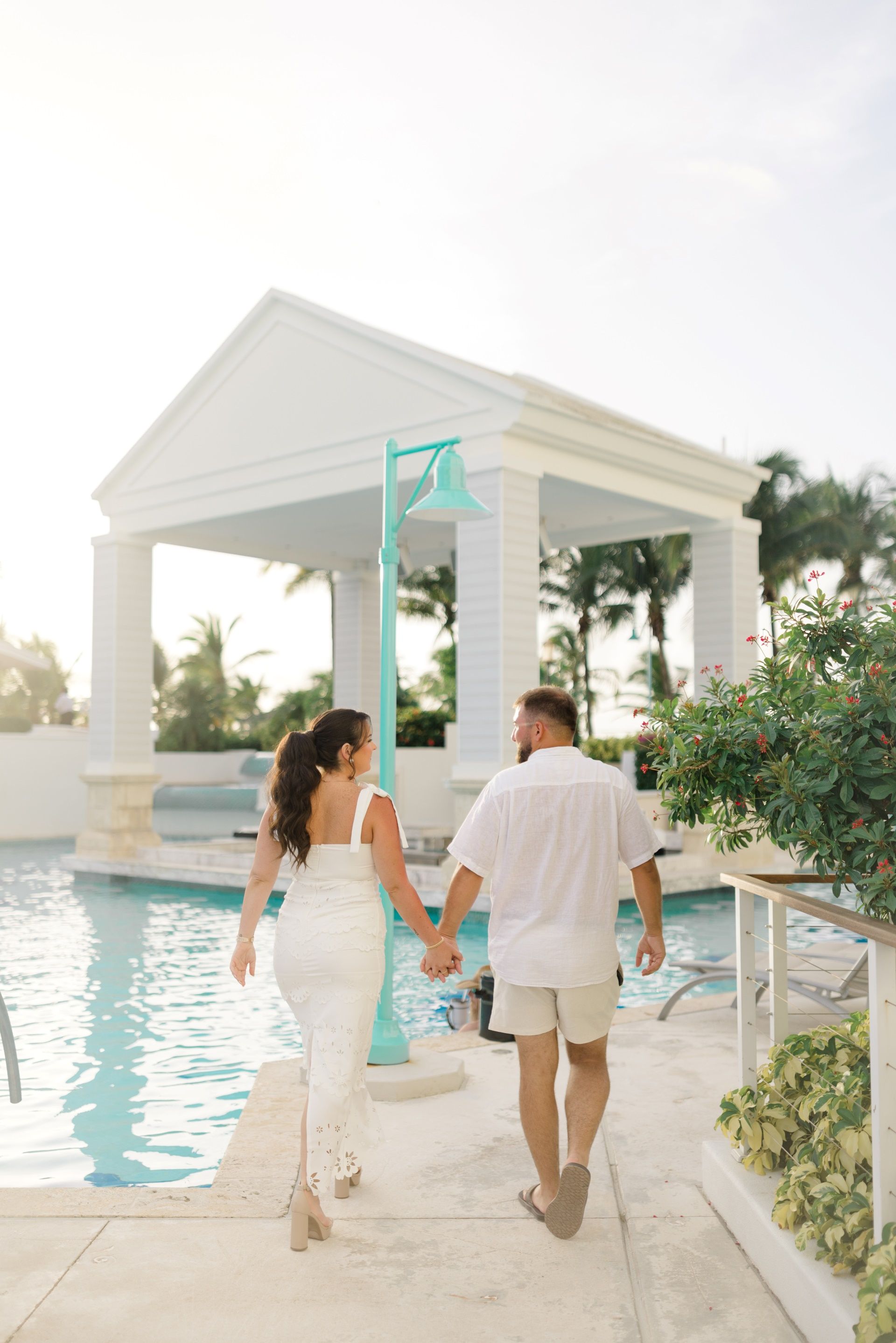 relaxed-walking-near-pool-sandals-royal-bahamian