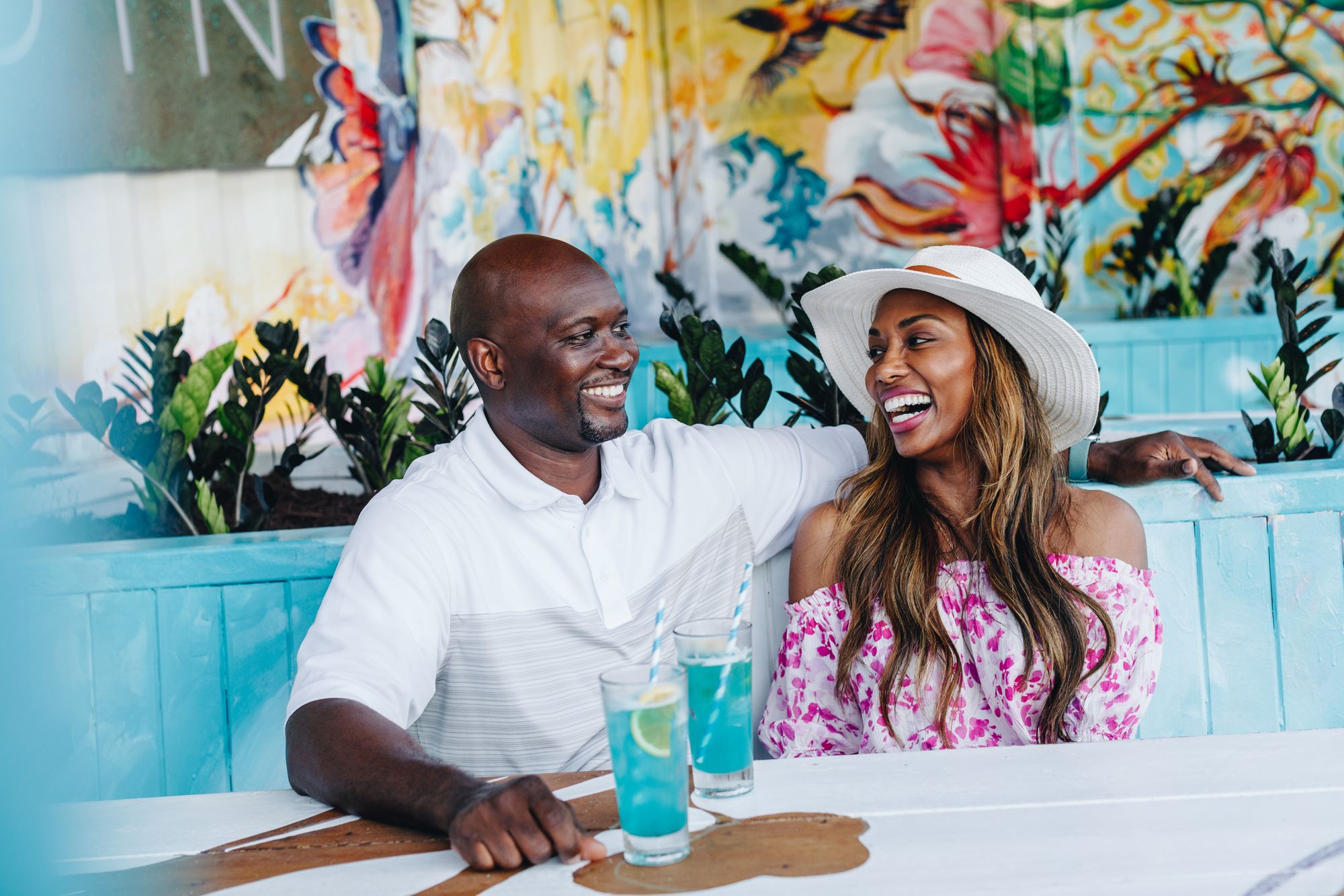 happy couple dining in Caribbean