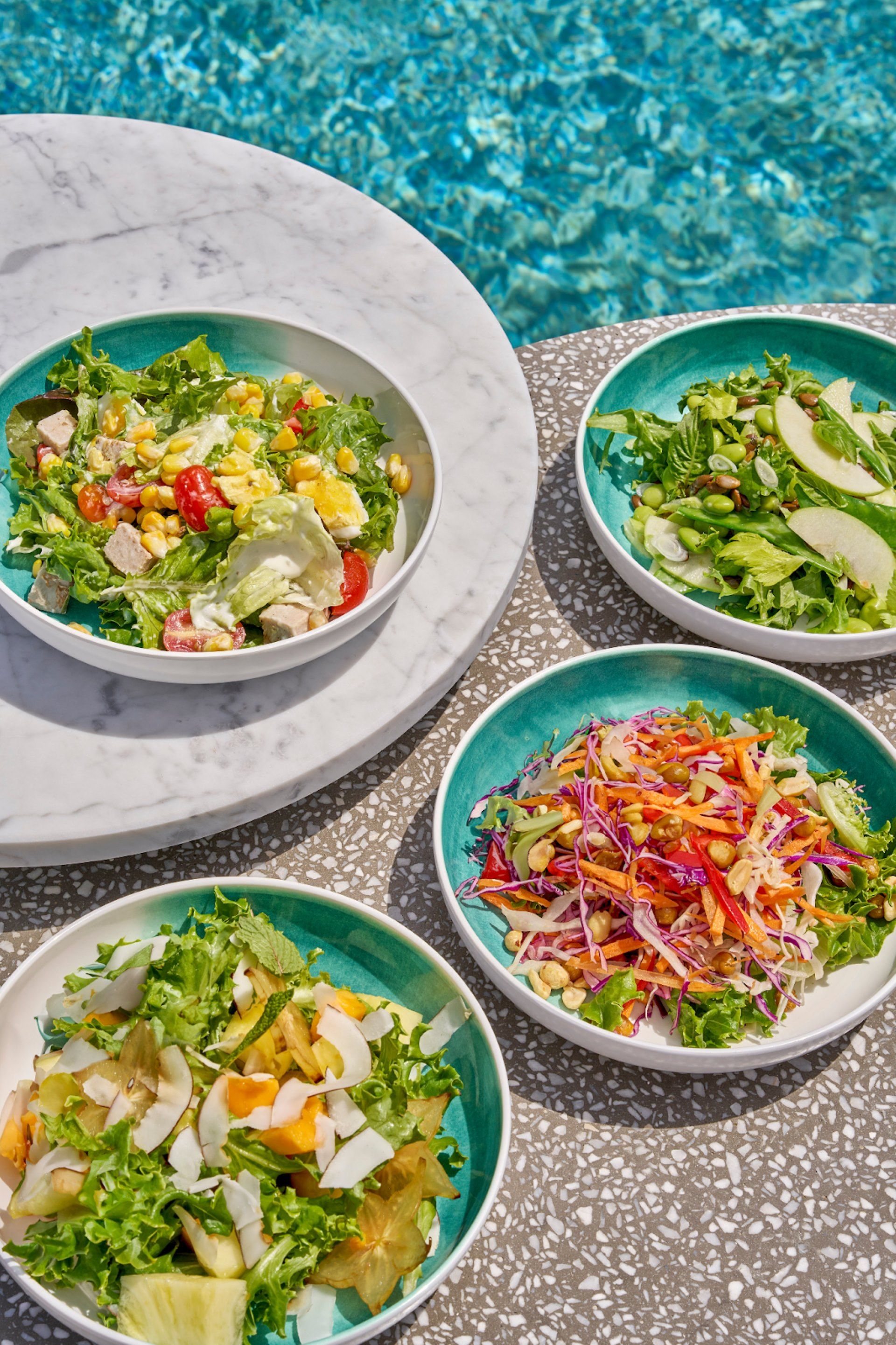 fresh-salad-served-near-pool