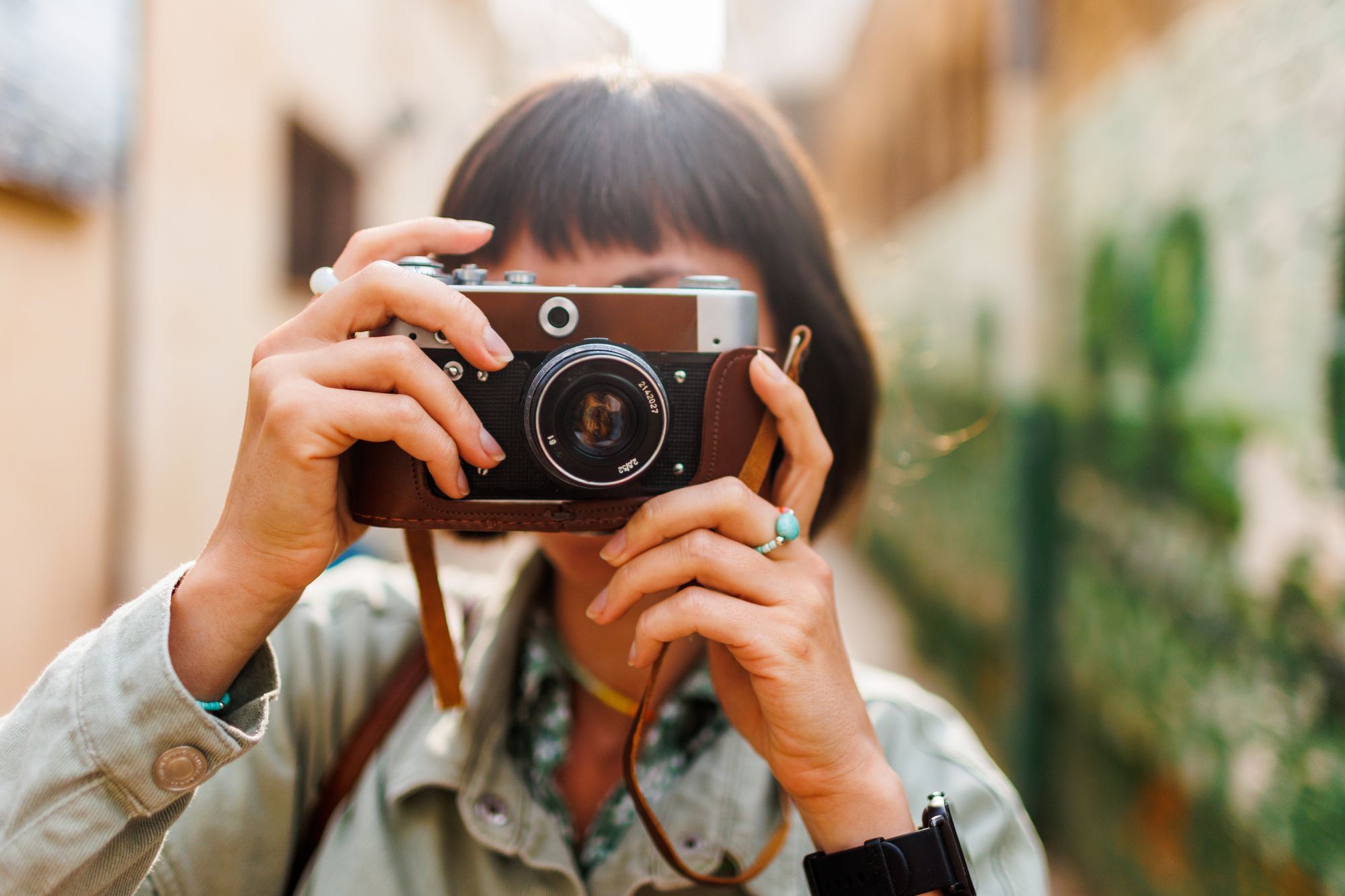 woman taking vacation photo