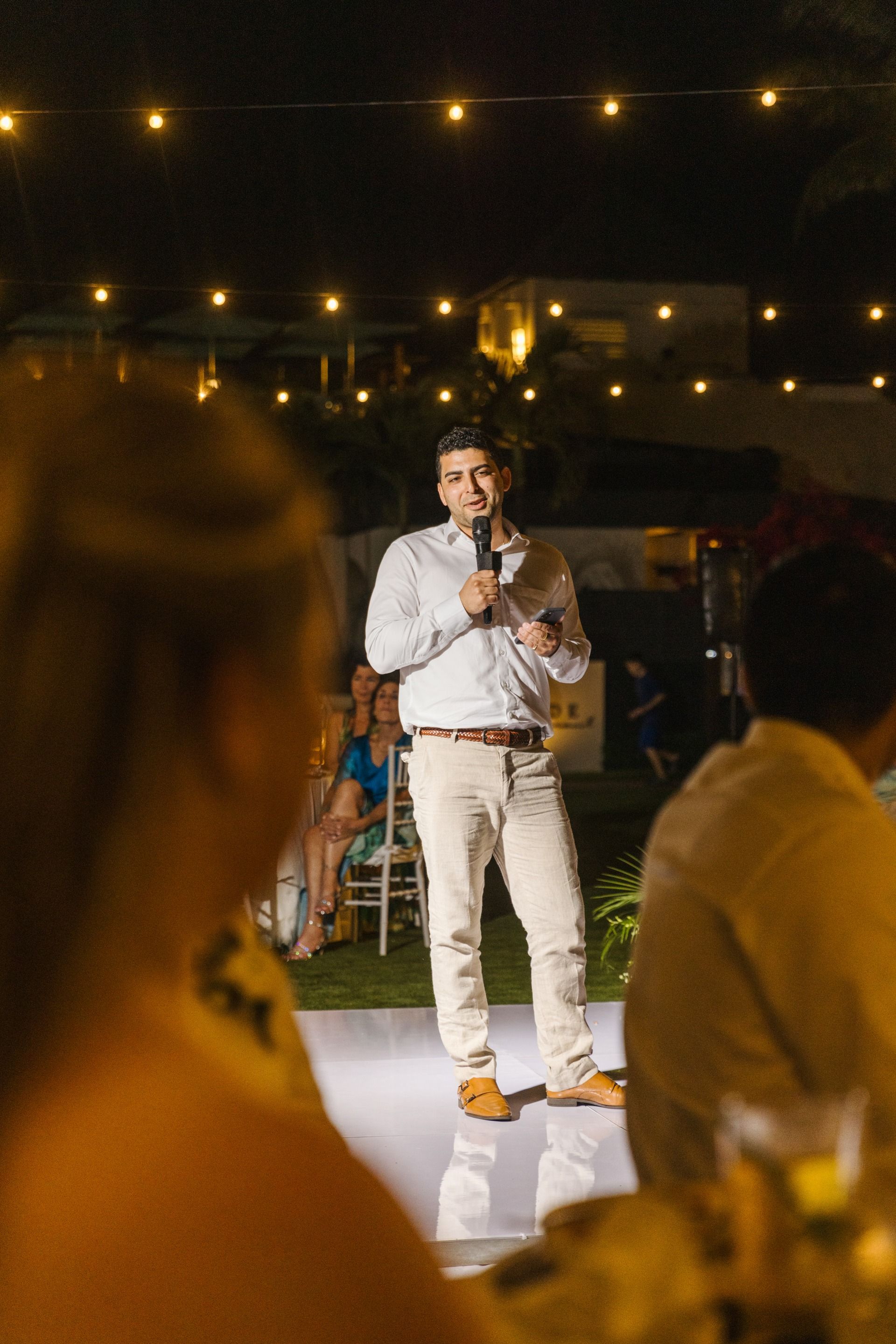 man-giving-speech-commanding-room