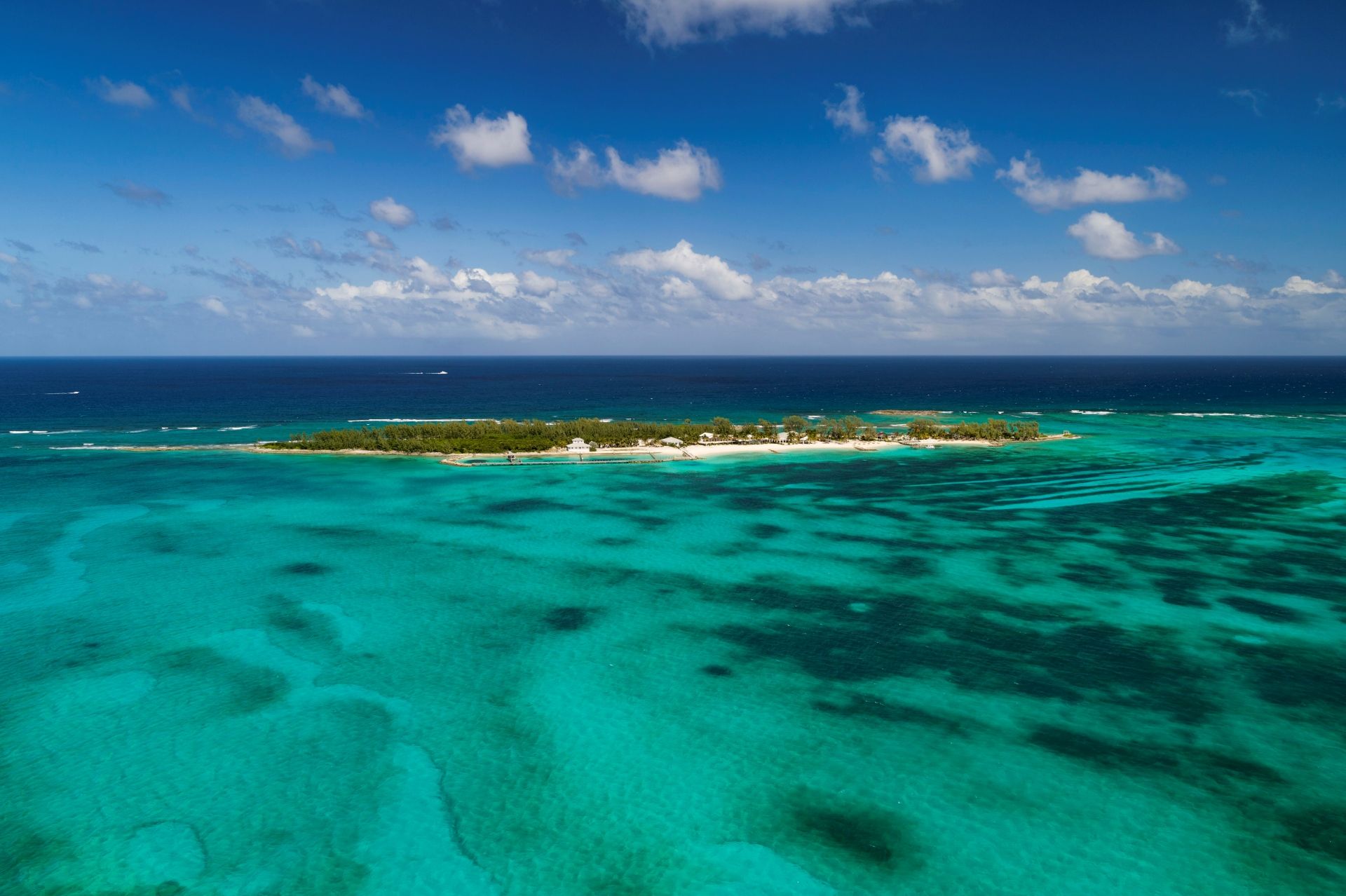 Calm clear water and soft white sand at Cable Beach in Nassau Bahamas