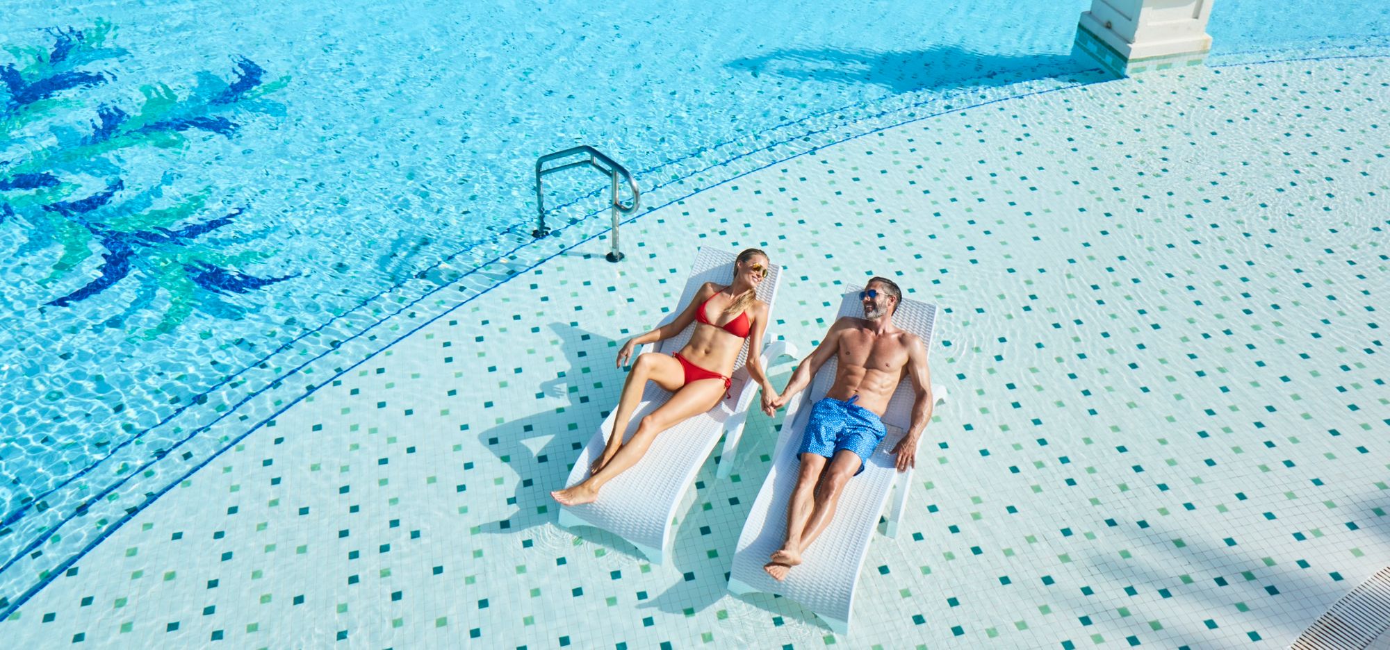 SAT-Lifestyle-Main-Pool-Couple-7