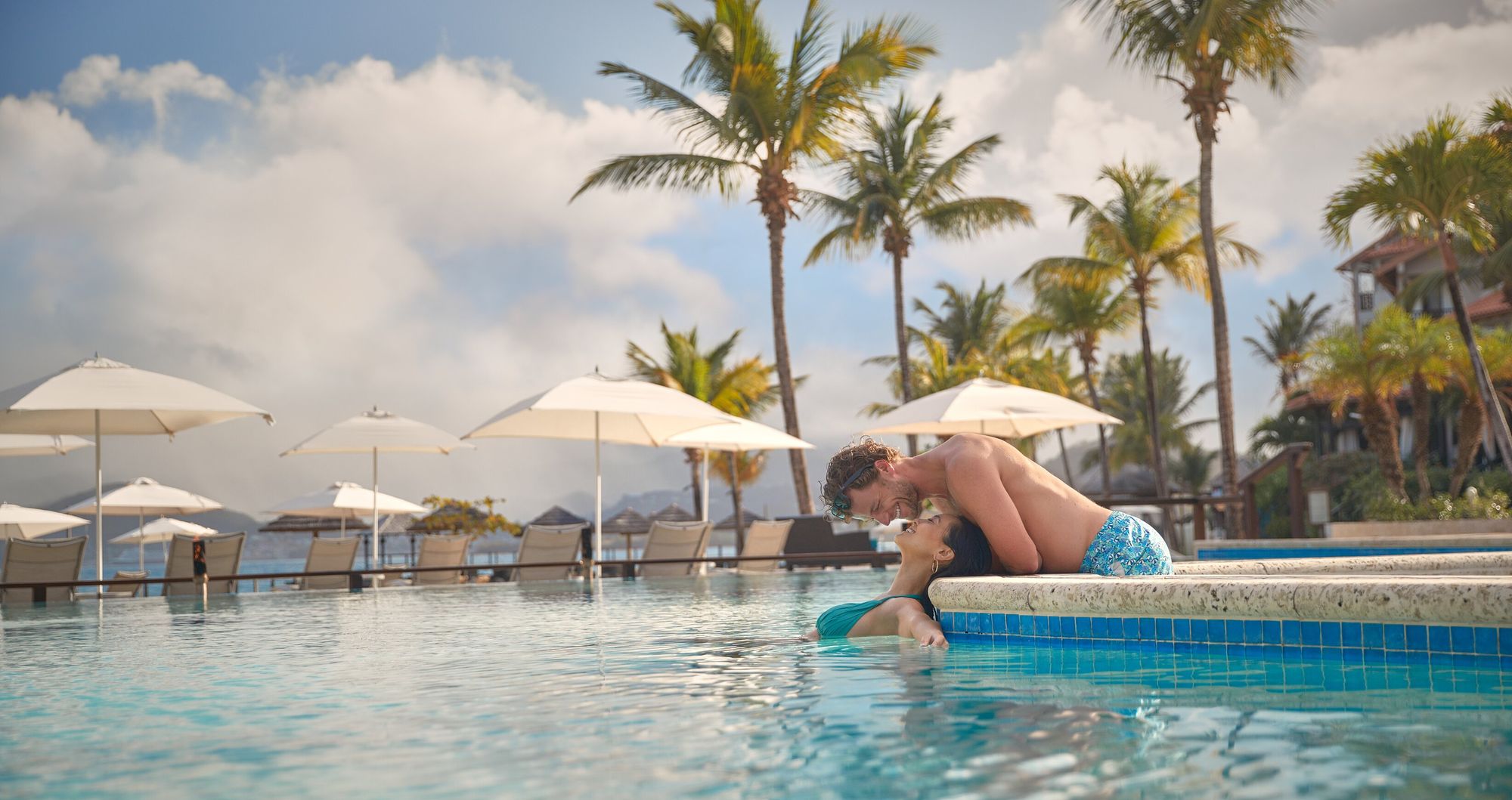 Web-Version-SLS-Lifestyle-Main-Pool-Couple-1